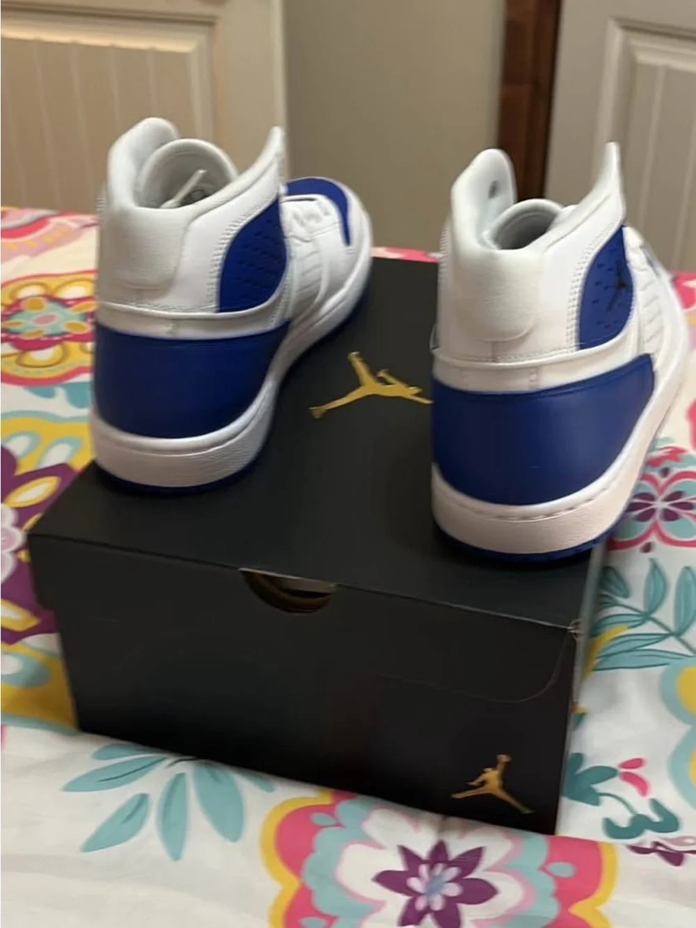 Jordan Men’s White and Blue High-Top Sneakers with Royal Blue Accents